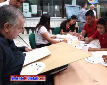 Joel Ramos en el Dia Munidal Pintor Boca y Pie